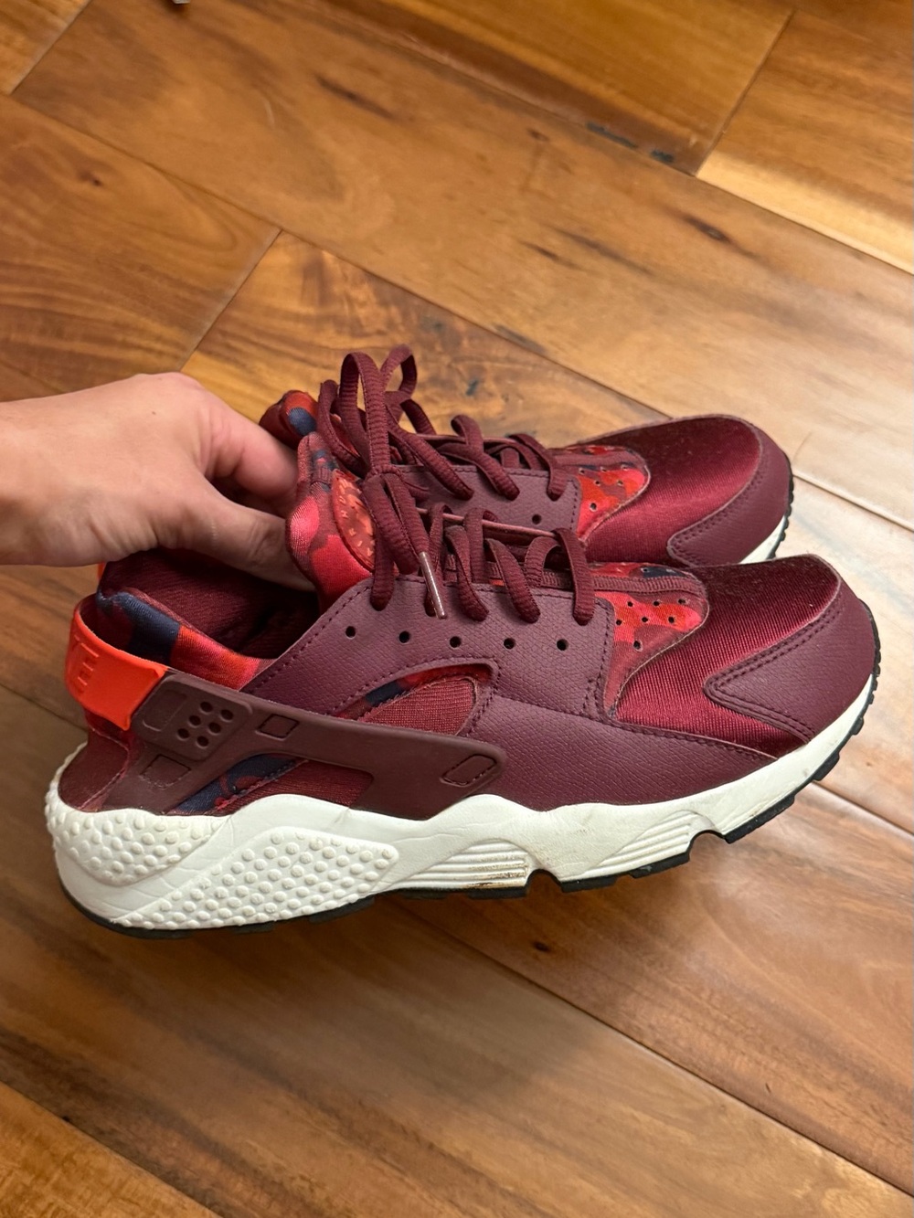 Nike woman’s Burgundy and White Athletic Sneakers